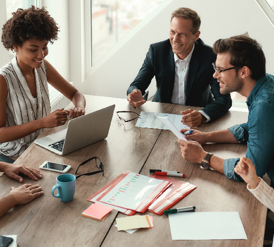 People Discussing In Office